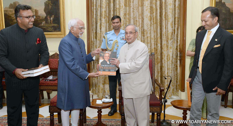 The President, Shri Pranab Mukherjee receiving the first copy of the book "The Education President" from the Vice President, Shri M. Hamid Ansari, published by the International Institute for Higher Education Research of the OP Jindal Global University, at Rashtrapati Bhavan, in New Delhi on June 08, 2016.