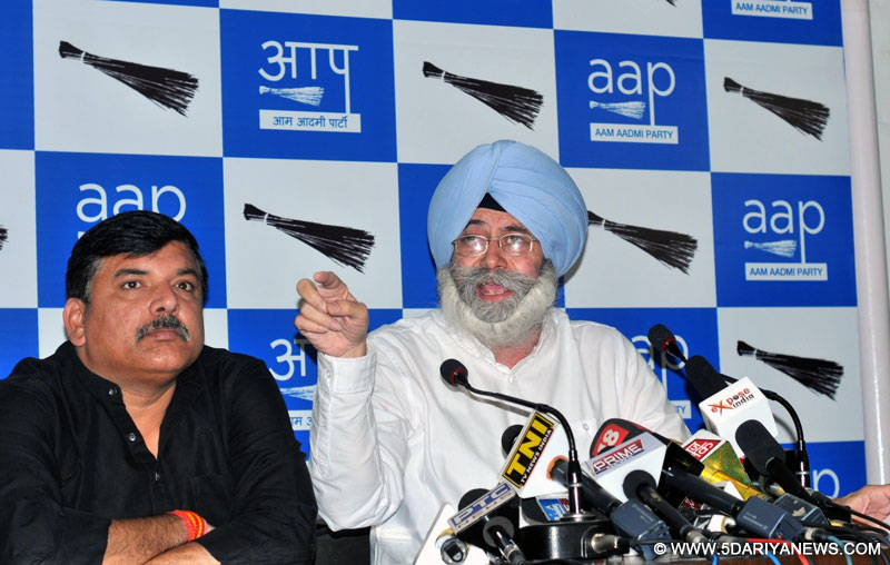 New Delhi: AAP leaders Sanjay Singh and HS Phoolka during a press conference in New Delhi, on June 13, 2016. 