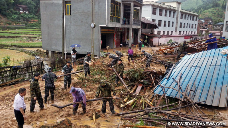 14 killed in China floods, landslides