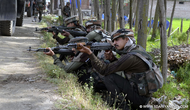 Soldiers in action during a gunbattle with militants in Jammu and Kashmir