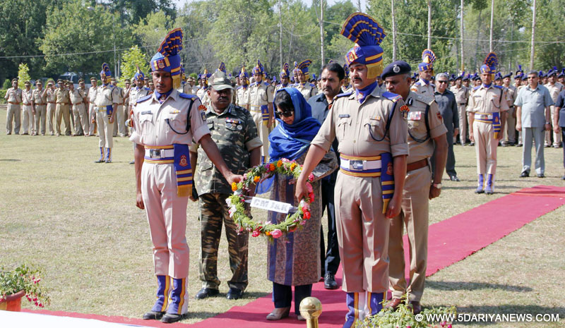 Jammu and Kashmir Chief Minister Mehbooba Mufti lays wreath at the coffins of CRPF martyrs who were killed in June 25 Pampore militant attack; in Srinagar on June 26, 2016. 