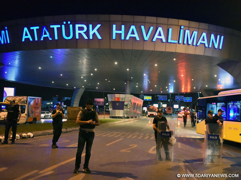Policemen stand guard at the entrance to Ataturk International Airport in Istanbul, Turkey, June 29, 2016. Turkish Prime Minister Binali Yildirim on Wednesday blamed the Islamic State for the bombing attacks that killed 36 people at the airport Tuesday night. 