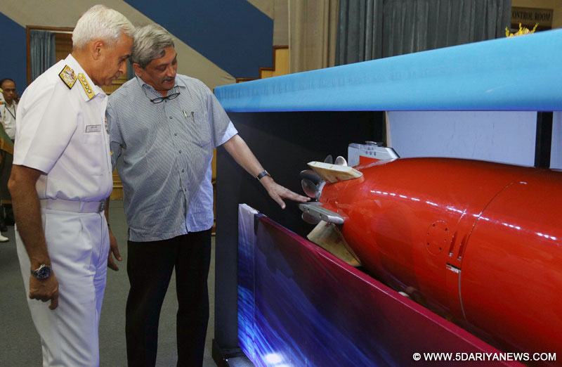  The Union Minister for Defence, Shri Manohar Parrikar and the Chief of Naval Staff, Admiral Sunil Lanba taking a close look at the ‘Varunastra’ torpedo, during the Handing Over Ceremony of ‘Varunastra’ torpedo to Indian Navy, in New Delhi on June 29, 2016. 