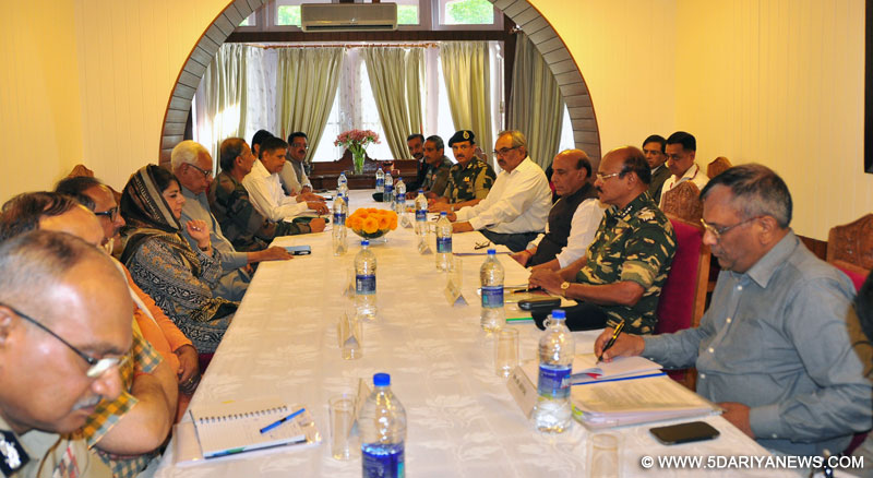 The Union Home Minister, Shri Rajnath Singh chairing a meeting on Strategic Security Review of Jammu and Kashmir with particular reference to the Amarnath Yatra, at Raj Bhavan, in Srinagar on July 01, 2016. The Governor of Jammu and Kashmir, Shri N.N. Vohra, the Chief Minister of Jammu and Kashmir, Ms. Mehbooba Mufti, the Union Home Secretary, Shri Rajiv Mehrishi and Senior Officials of the MHA, MoD and State Government are also seen.