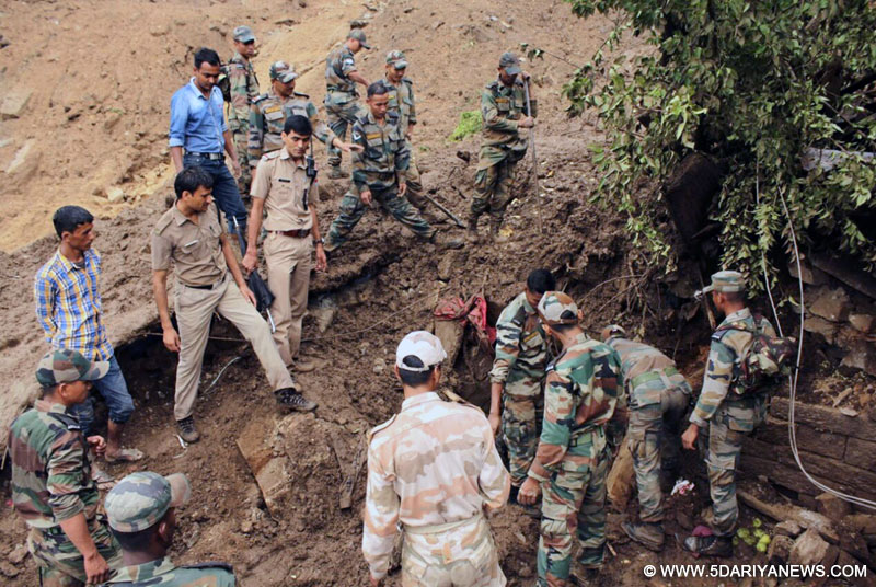 Army and police personnel during a rescue operation in Pithoragarh of Uttarakhand on on July 2, 2016.