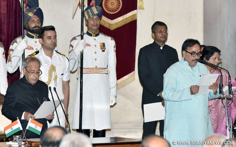 The President, Shri Pranab Mukherjee administering the oath as Minister of State to Dr. Mahendra Nath Pandey, at a Swearing-in Ceremony, at Rashtrapati Bhavan, in New Delhi on July 05, 2016.
