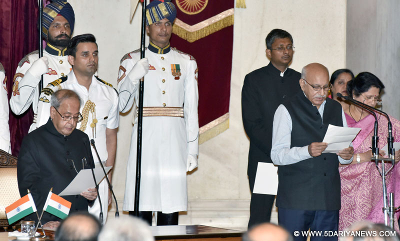 The President, Shri Pranab Mukherjee administering the oath as Minister of State to Shri M.J. Akbar, at a Swearing-in Ceremony, at Rashtrapati Bhavan, in New Delhi on July 05, 2016.