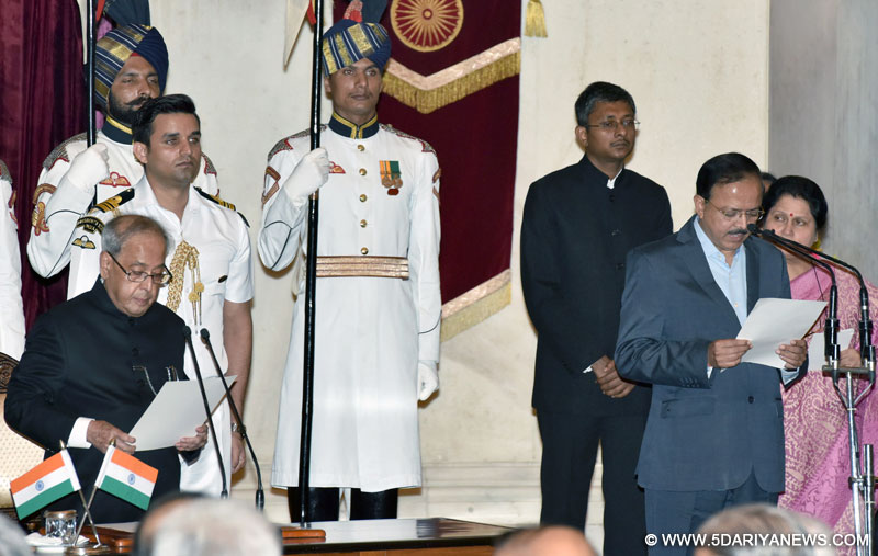 The President, Shri Pranab Mukherjee administering the oath as Minister of State to Shri Shri Subhash Ramrao Bhamre, at a Swearing-in Ceremony, at Rashtrapati Bhavan, in New Delhi on July 05, 2016.