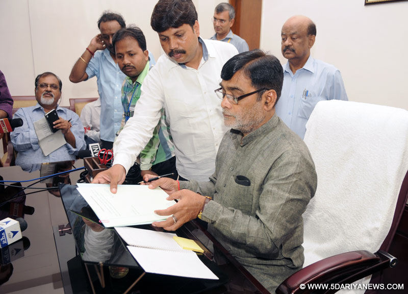 The Minister of State for Rural Development, Shri Ram Kripal Yadav takes charge in his office, in New Delhi on July 08, 2016.
