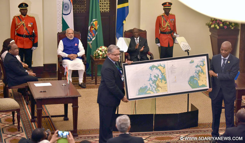 Narendra Modi and the President of the United Republic of Tanzania, Dr. John Magufuli, witnessing handing over of a navigational 