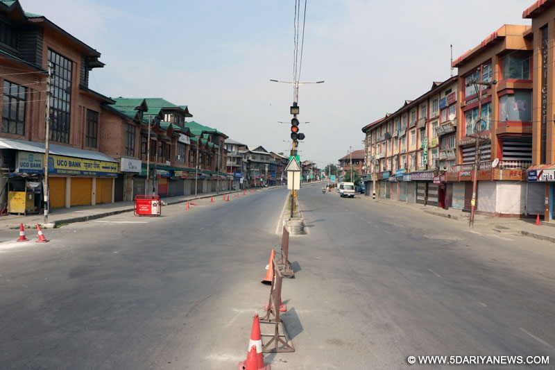 A view of deserted roads of Srinagar as curfew continued for the 6th day in most parts of the Kashmir valley where 37 people died in the vicious cycle of violence that plagued the valley after the killing of Hizbul commander Burhan Wani last week; on July 14, 2016.