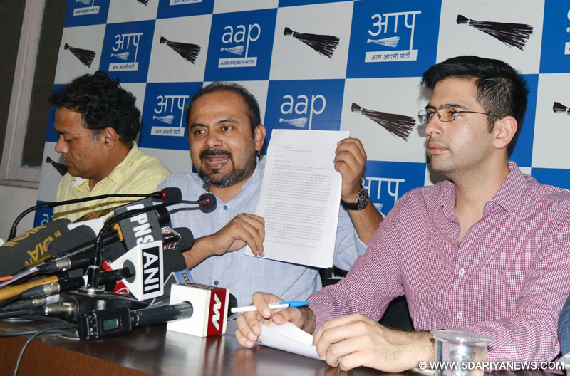New Delhi: AAP leader Dilip Pandey, Nitin Tyagi and Raghav Chadha address a press conference against the Central Government in New Delhi on July 14, 2016. 