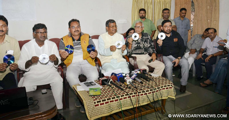 Former Jharkhand Chief Minister and Jharkhand Vikash Morcha President Babulal Marandi and others release CDs containing evidence of horse trading in recently held Rajya Shabha elections in Jharkhand in Ranchi on July 15, 2016.