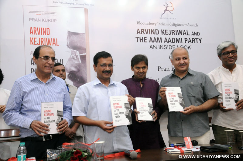 Delhi Chief Minister Arvind Kejriwal and Deputy Chief Minister Manish Sisodia during the release of a book "Arvind Kejriwal and The Aam Admi Party An Inside Look" written by Pran Kurup, in New Delhi on July 19, 2016. Also seen AAP leader Ashutosh.