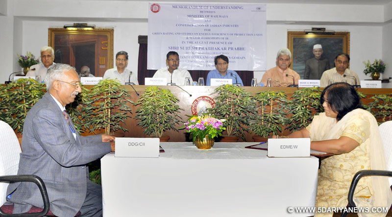 The Union Minister for Railways, Shri between Ministry of Railways and Confederation of Indian Industry (CII) on Green Industrial Units, in New Delhi on July 26, 2016. The Minister of State for Communications (Independent Charge) and Railways, Shri Manoj Sinha, the Minister of State for Railways, Shri Rajen Gohain, the Chairman, Railway Board, Shri A.K. Mital and other dignitaries are also seen.