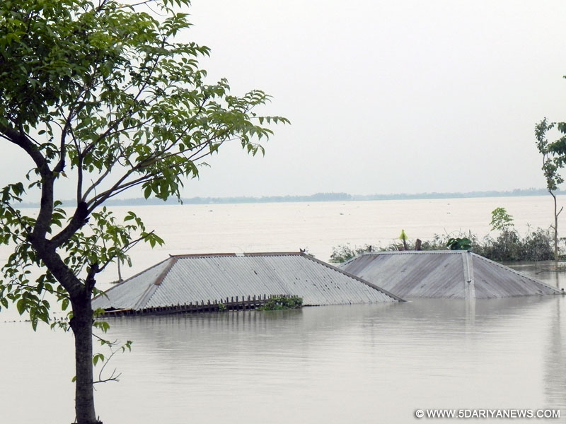 A submerged house in flood-hit Cooch Behar District of West Bengal on July 26, 2016. 