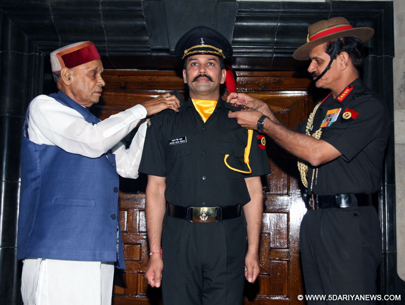 Army chief Dalbir Singh Sihag commissioning BJP MP Anurag Thakur into the Territorial Army in Delhi on Friday. The BJP leader\