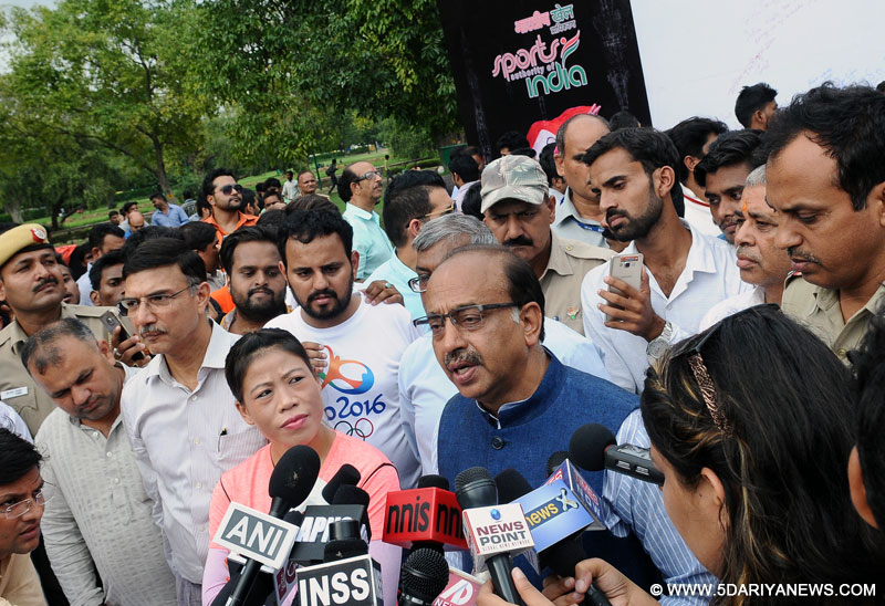 The Minister of State for Youth Affairs and Sports (I/C), Water Resources, River Development and Ganga Rejuvenation, Shri Vijay Goel interacting with the media after inaugurating ‘Wall of Wishes’ & ‘Digital Campaign of Wishes’ for Indian Olympic contingent, in New Delhi on August 02, 2016. The Renowned Boxer and Olympian Ms. Mary C. Kom and the Secretary, Ministry of Youth & Sports, Shri Rajiv Yadav are also seen.