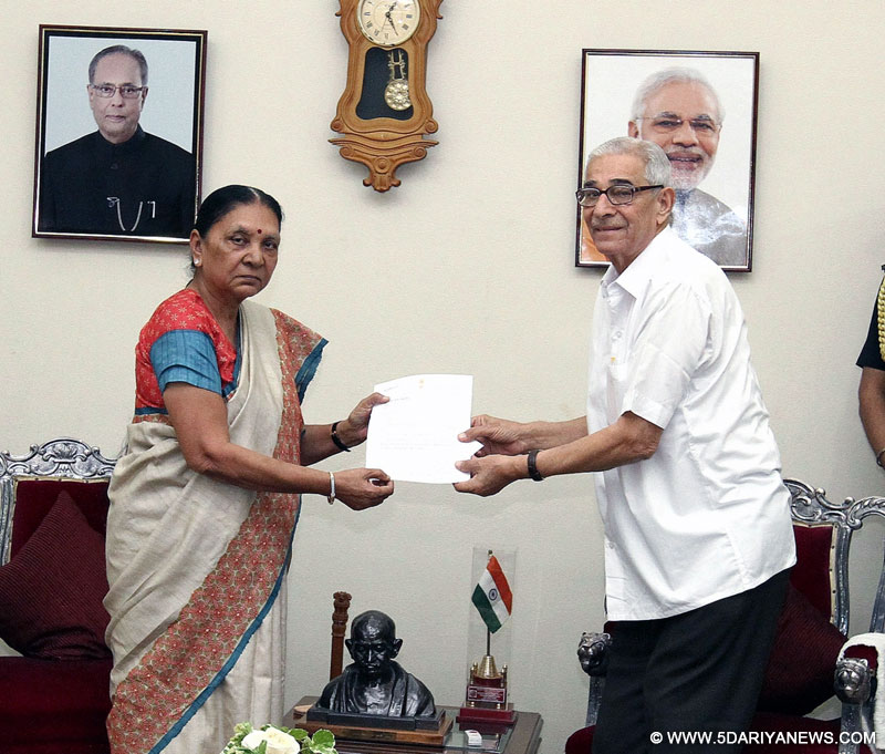 Gujarat Chief Minister Anandiben Patel hands over her resignation to Governor OP Kohli at Raj Bhavan in Gandhinagar on Aug 3, 2016. 