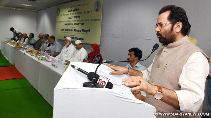 The Minister of State for Minority Affairs (Independent Charge) and Parliamentary Affairs, Shri Mukhtar Abbas Naqvi greeting the Haj Pilgrims, during the first flight flag-off ceremony, in New Delhi on August 03, 2016.