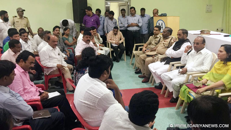 The Union Minister for Heavy Industries and Public Enterprises, Shri Anant Geete and the Minister of State for Home Affairs, Shri Hansraj Gangaram Ahir reviewing Search and Rescue Operations with the District Officers for victims of a bridge collapse across the Savitri river near Mahad, in Raigad district, Maharashtra on August 04, 2016.