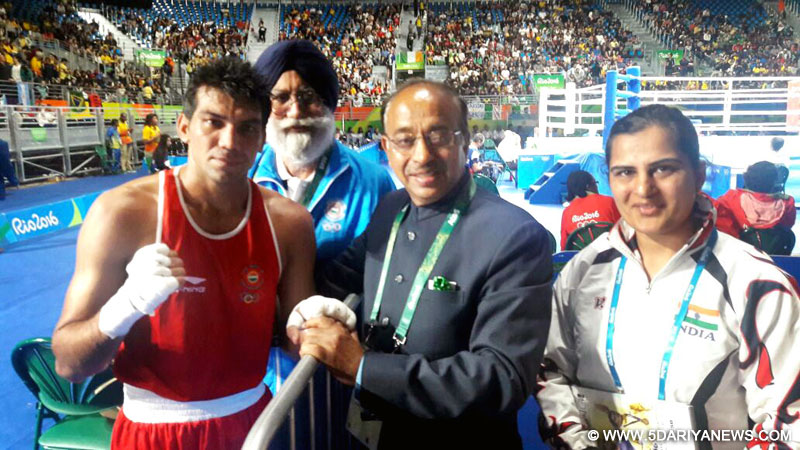 The Minister of State for Youth Affairs and Sports (I/C), Water Resources, River Development and Ganga Rejuvenation,  Vijay Goel greeting the Indian Boxer Manoj Kumar (64 kg category) after he defeated Petrauskas E. of Lithuania, at Rio on August 10, 2016. Boxing Coach Shri G.S. Sandhu is also seen.