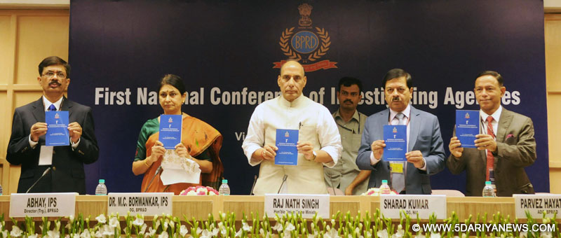 The Union Home Minister, Shri Rajnath Singh releasing a brochure, at the inaugural ceremony of the 1st National Conference of Investigating Agencies, in New Delhi on August 12, 2016. The DG, NIA, Shri Sharad Kumar, the DG, Bureau of Police Research and Development (BPR&D), Dr. M.C. Borwankar and other dignitaries are also seen.
