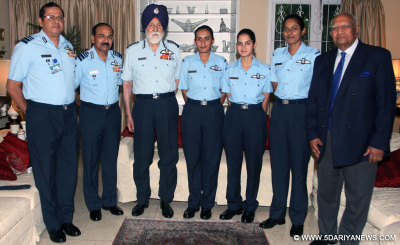 The Marshal of the Indian Air Force (MIAF) Arjan Singh along with the Chief of the Air Staff, Air Chief Marshal Arup Raha, the former Chief of the Air Staff N.C. Suri and Air Officer in charge Personnel (AOP) Air Marshal B. Suresh with three newly commissioned women fighter pilots, in New Delhi on August 12, 2016.