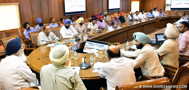 Punjab Chief Minister Mr. Parkash Singh Badal presiding over a meeting with the delegation of piggery farmers and senior officers of the Animal Husbandry Department at Punjab Bhawan, Chandigarh on Sunday