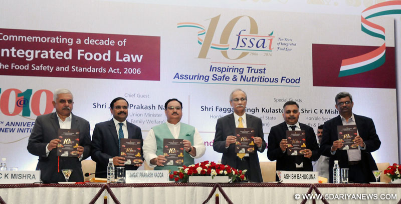 The Union Minister for Health & Family Welfare, Shri J.P. Nadda releasing the publication at the commemorative event to mark a decade of Integrated Food Law: The Food Safety and Standard Act, 2006, in New Delhi on August 22, 2016. The Secretary (Health), Shri C.K. Mishra and other dignitaries are also seen.