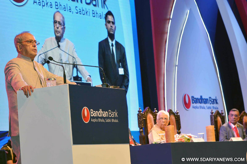 The President, Shri Pranab Mukherjee addressing at the first foundation day of Bandhan Bank, in Kolkata on August 23, 2016. The Governor of West Bengal, Shri Keshari Nath Tripathi is also seen.