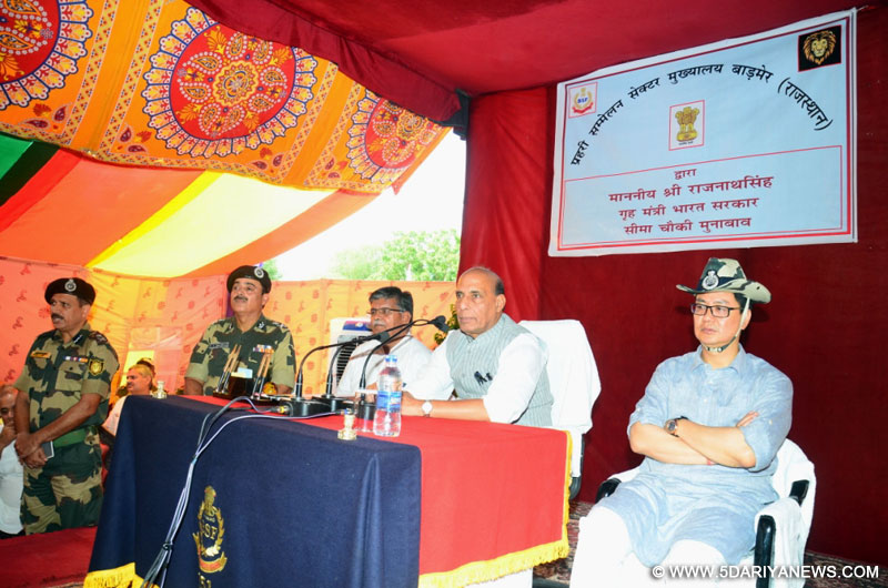 The Union Home Minister, Shri Rajnath Singh addressing the BSF jawans & officers, during his visit to the BSF Munabao Border Outpost (BOP), in Barmer, Rajasthan on October 08, 2016. The Minister of State for Home Affairs, Shri Kiren Rijiju, the Home Minister of Rajasthan, Shri Gulab Chand Kataria and the Director General, BSF, Shri K.K. Sharma are also seen.