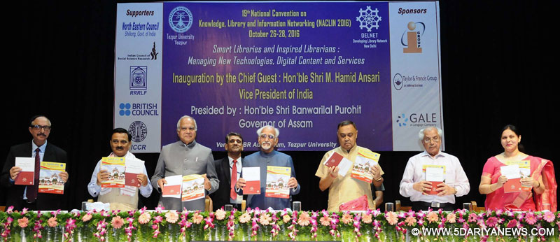 The Vice President, Shri M. Hamid Ansari releasing the publications, at the 19th National Convention on Knowledge, Library and Information Networking - NACLIN 2016, at Tezpur University, in Assam on October 26, 2016. The Governor of Assam, Shri Banwarilal Purohit and the Minister for Irrigation, Handloom & Textiles, Assam, Shri Ranjit Dutta are also seen.