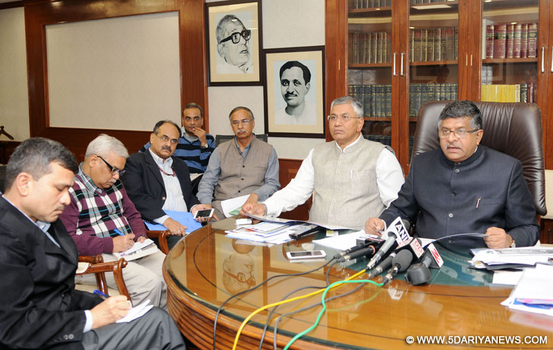 The Union Minister for Electronics & Information Technology and Law & Justice, Shri Ravi Shankar Prasad briefing the media on the initiatives taken for popularising cashless transactions, in New Delhi on December 16, 2016. The Minister of State for Electronics & Information Technology and Law & Justice, Shri P.P. Chaudhary and the Secretary, Ministry of Electronics & Information Technology, Ms. Aruna Sundararajan are also seen.
