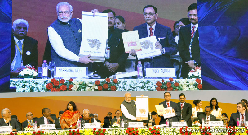 The Prime Minister, Shri Narendra Modi releasing the policy booklet & coffee table book, at the Vibrant Gujarat Global Summit 2017, at Mahatma Mandir, in Gandhinagar, Gujarat on January 10, 2017. 