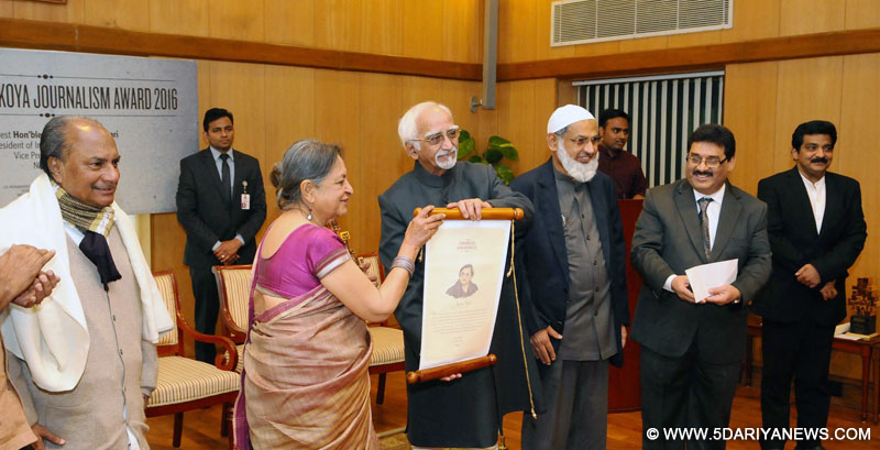 The Vice President, Shri M. Hamid Ansari giving away the C.H. Mohammed Koya National Journalism Award 2016 to the Sr. Journalist, The Hindu, Ms. Neena Vyas, in New Delhi on January 20, 2017.