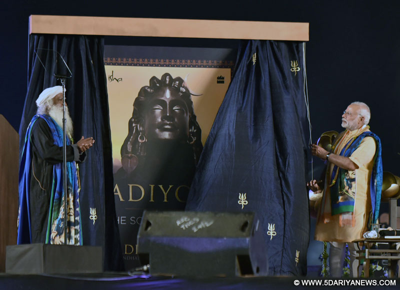 The Prime Minister, Shri Narendra Modi releasing the book ‘Adiyogi - The Source of Yoga’ at the unveiling ceremony of 112 feet statue of face of ‘Adiyogi - The Shiva’, organised by the Isha Foundation, in Coimbatore, Tamil Nadu on February 24, 2017.