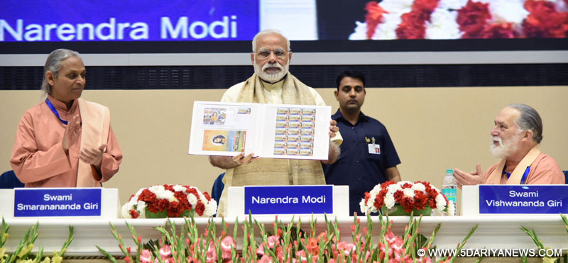 The Prime Minister, Shri Narendra Modi releasing the Special Commemorative Postage Stamp on 100 years of Yogoda Satsang Math, at Vigyan Bhawan, in New Delhi on March 07, 2017.