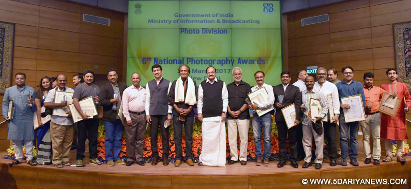 Venkaiah Naidu releasing a brochure, at the 6th National Photography Awards Ceremony, in New Delhi on March 22, 2017. The Minister of State for Information & Broadcasting, Col. Rajyavardhan Singh Rathore also seen.