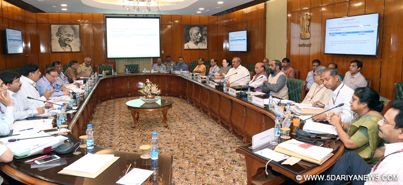 The Union Home Minister, Shri Rajnath Singh chairing a high level meeting to review the progress of Prime Minister
