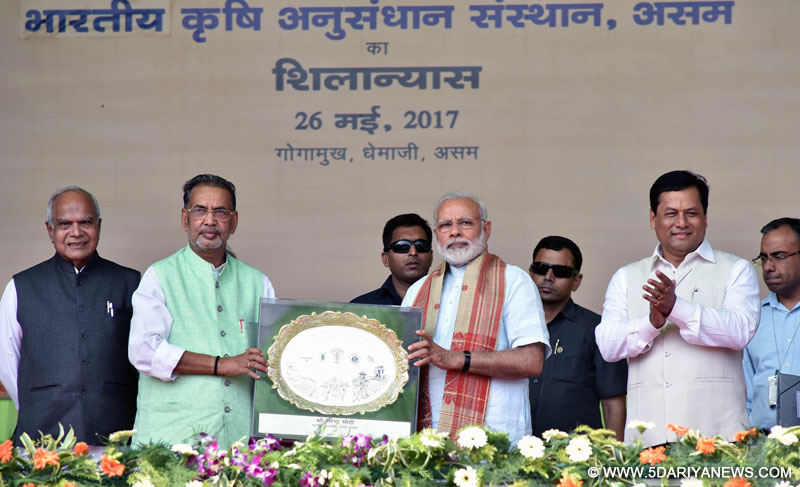  The Prime Minister, Shri Narendra Modi at the ceremony to lay the Foundation Stone for Indian Agriculture Research Institute (IARI), at Gogamukh, Assam on May 26, 2017. The Governor of Assam, Shri Banwarilal Purohit, the Union Minister for Agriculture and Farmers Welfare, Shri Radha Mohan Singh and the Chief Minister of Assam, Shri Sarbananda Sonowal are also seen.