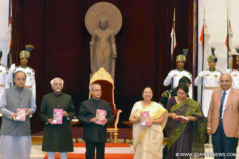 The Speaker, Lok Sabha, Smt. Sumitra Mahajan releasing the book ‘Marching with A Billion - Analysing Narendra Modi’s Government at Midterm’, authored by Shri Uday Mahurkar and first copy presented to the President, Shri Pranab Mukherjee, at Rashtrapati Bhavan, in New Delhi on May 26, 2017. The Vice President, Shri M. Hamid Ansari and the Union Minister for Finance, Corporate Affairs and Defence, Shri Arun Jaitley are also seen.