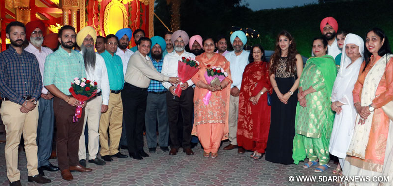 Prosecution and Litigation Law Officers’ Association presenting bouquets to A.S. Sandhu during a farewell party on his superannuation as Director Prosecution & Litigation at Chandigarh.