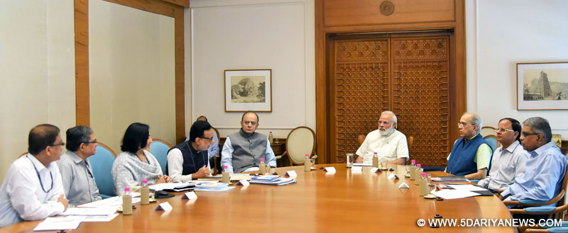 The Prime Minister, Shri Narendra Modi reviewing the status of GST, which is to be implemented from July 01, in New Delhi on June 05, 2017. 