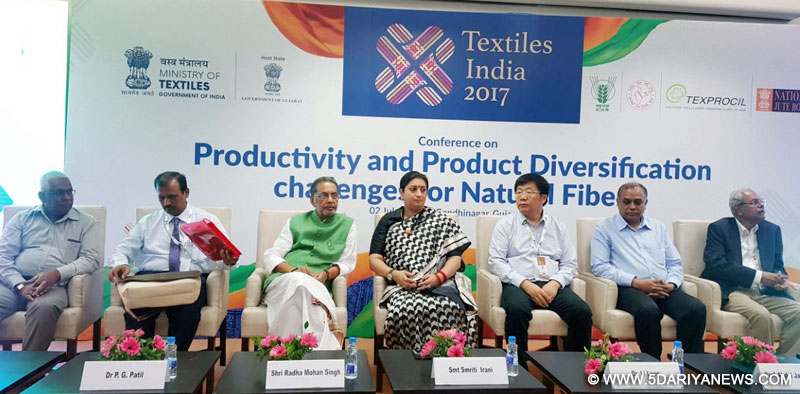  The Union Minister for Agriculture and Farmers Welfare, Shri Radha Mohan Singh and the Union Minister for Textiles, Smt. Smriti Irani during the conference titled “Productivity and Product Diversification challenges for Natural Fibers”, at Textiles India 2017, in Gandhinagar, Gujarat on July 02, 2017.