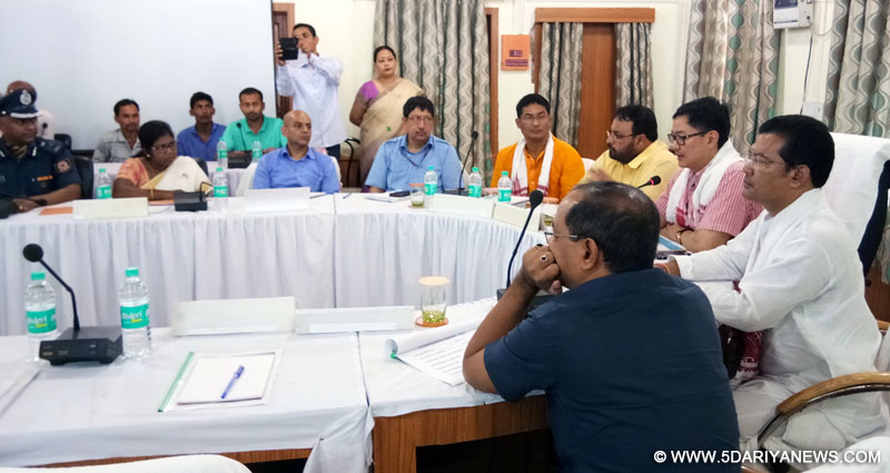 The Minister of State for Home Affairs, Shri Kiren Rijiju chairing a review meeting with the Senior Officers, on the Rescue and Relief Operations in flood affected Assam, at Dhemaji district, in Assam on July 13, 2017.
