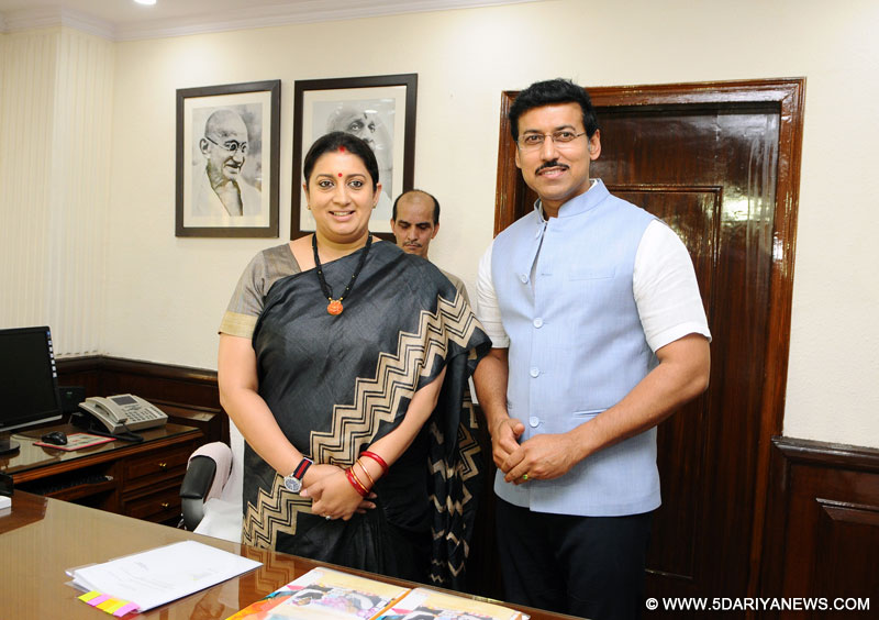 Smt. Smriti Irani takes charge as the Minister of Information & Broadcasting, in New Delhi on July 18, 2017. The Minister of State for Information & Broadcasting, Col. Rajyavardhan Singh Rathore is also seen.