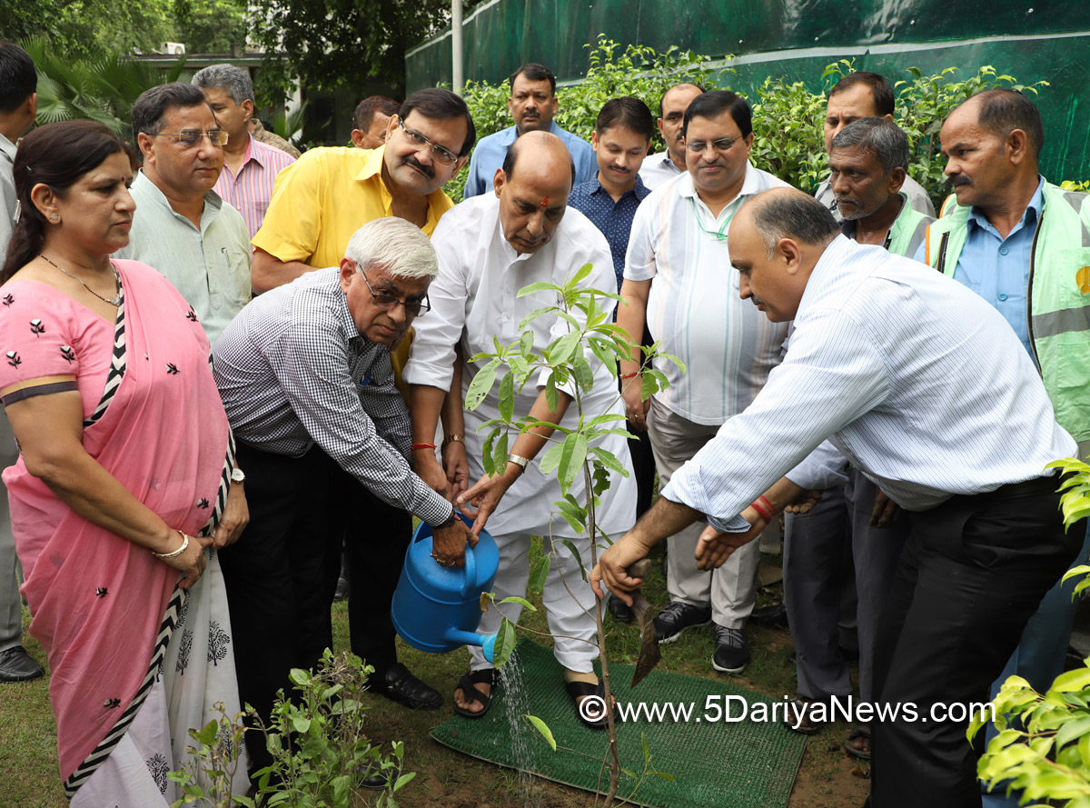 The Union Home Minister, Shri Rajnath Singh planting a sapling of Rudraksh tree at his residence, as a part of New Delhi Municipal Council (NDMC) Tree Plantation campaign, in New Delhi on August 05, 2017. The Chairman, NDMC, Shri Naresh Kumar is also seen. 