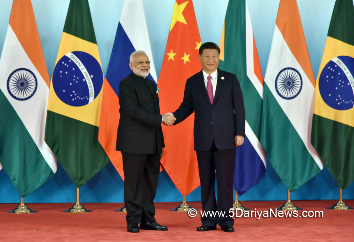 The Prime Minister, Shri Narendra Modi being welcomed by the President of the People’s Republic of China, Mr. Xi Jinping, at the 9th BRICS Summit, in Xiamen, China on September 04, 2017.