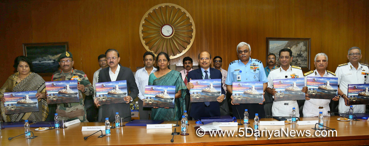  The Union Minister for Defence, Smt. Nirmala Sitharaman releasing a first-ever Coffee Table Book on Department of Defence Production titled ‘A Journey Towards Self-Reliance’, in New Delhi on October 27, 2017. The Minister of State for Defence, Dr. Subhash Ramrao Bhamre, the Secretary (Defence Production), Shri A.K. Gupta and other dignitaries are also seen.